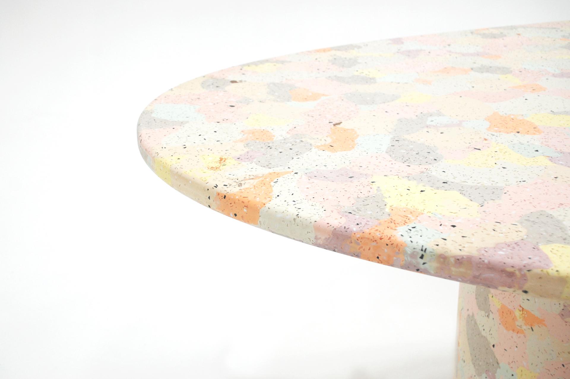Colorful terrazzo table design showcased at Surface Design Show 2023, highlighting innovative materials and contemporary aesthetics.