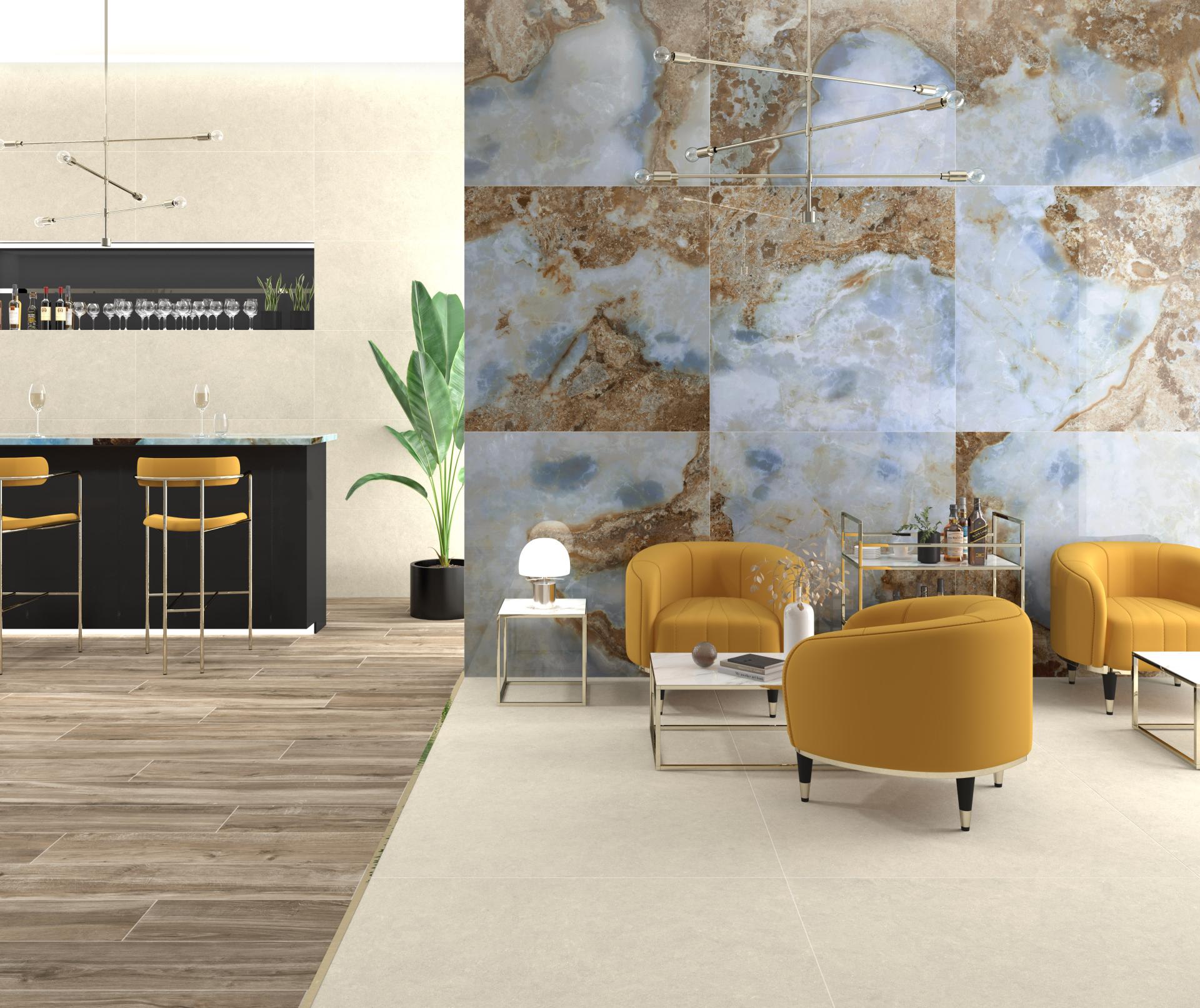 Modern living space featuring stylish yellow armchairs, a sleek bar area, and elegant tile designs reflecting Tile of Spain trends.