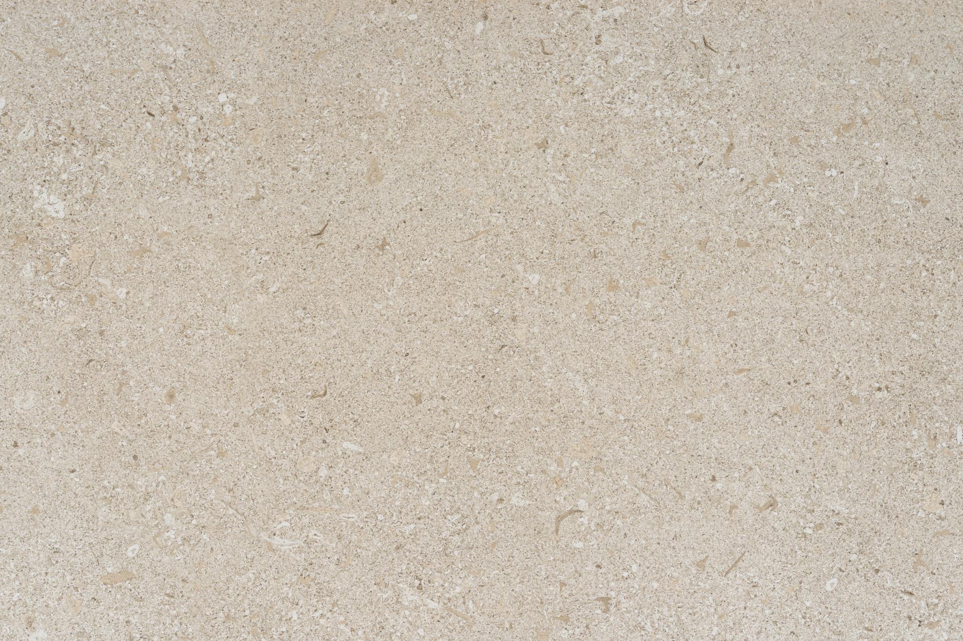 Dekton® Pietra Kode surface featuring a beige, textured design inspired by classic Italian architecture and natural stone aesthetics.