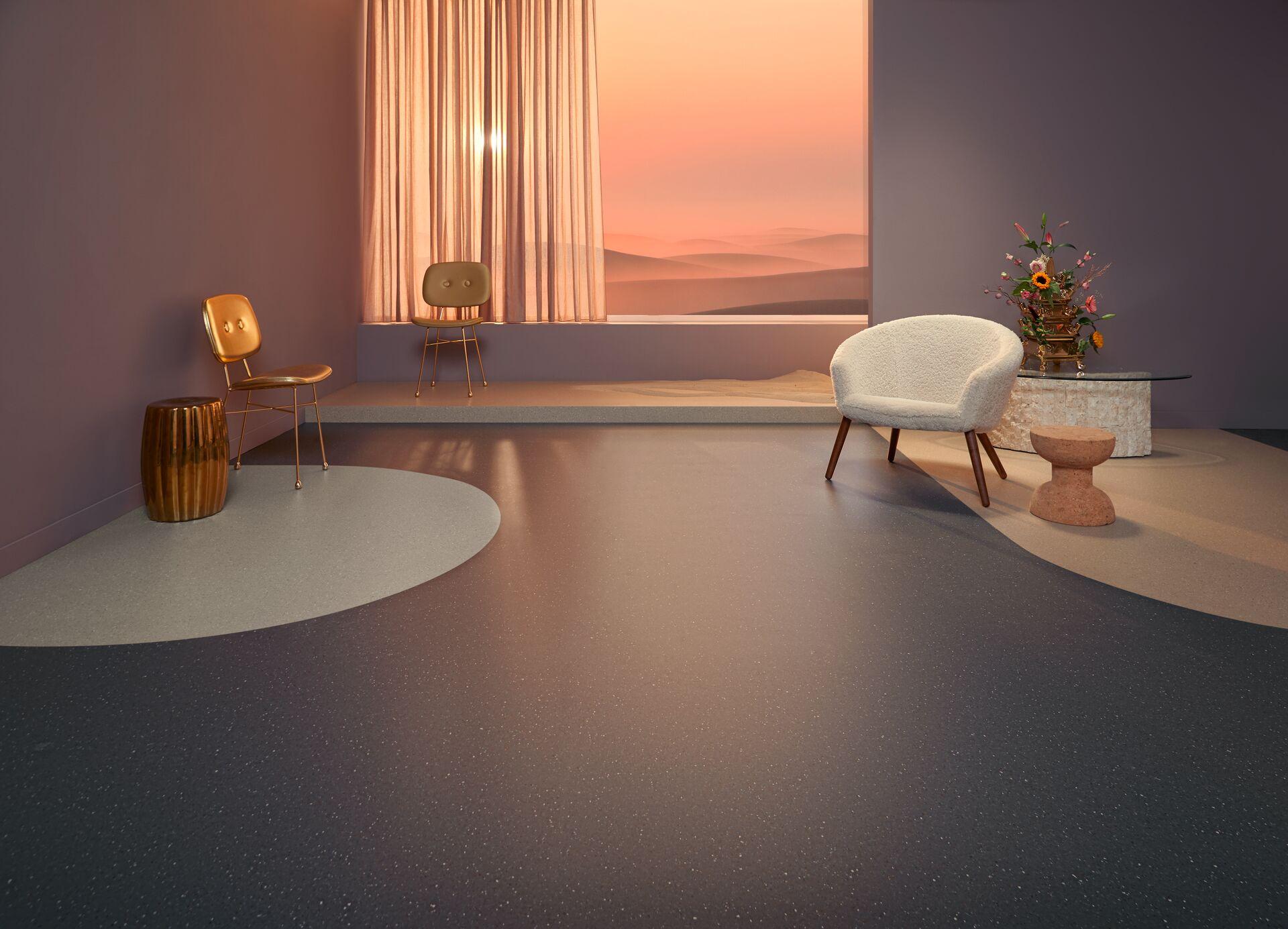 Modern healthcare flooring featuring a textured design, stylish furniture, and a soft color palette creating a serene environment.