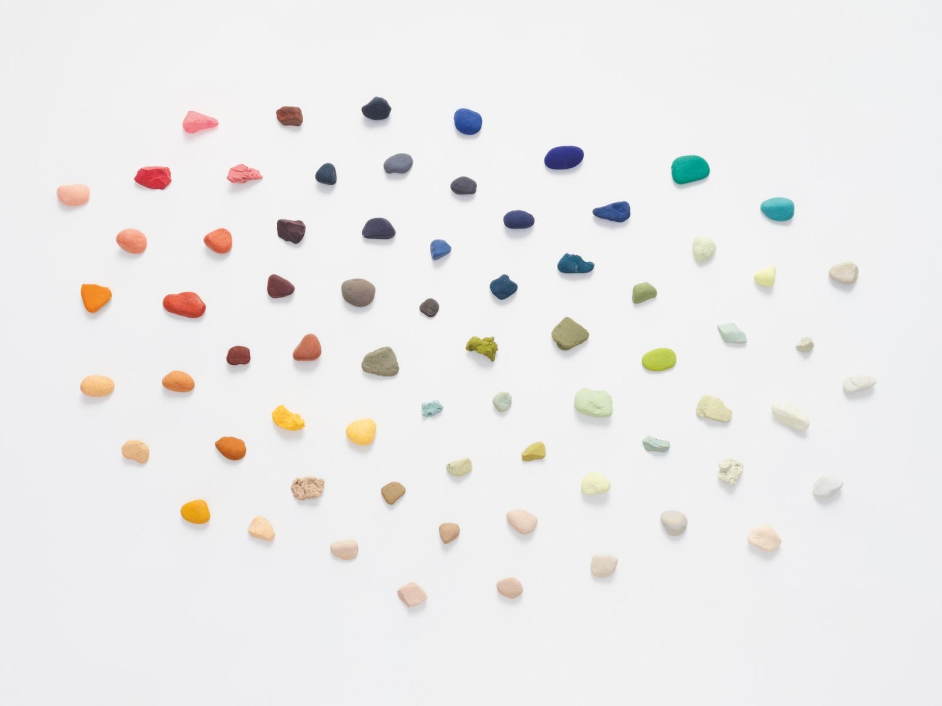 Colorful textile samples arranged artistically, showcasing Kvadrat's Winter 2021 Collection with diverse hues and textures.