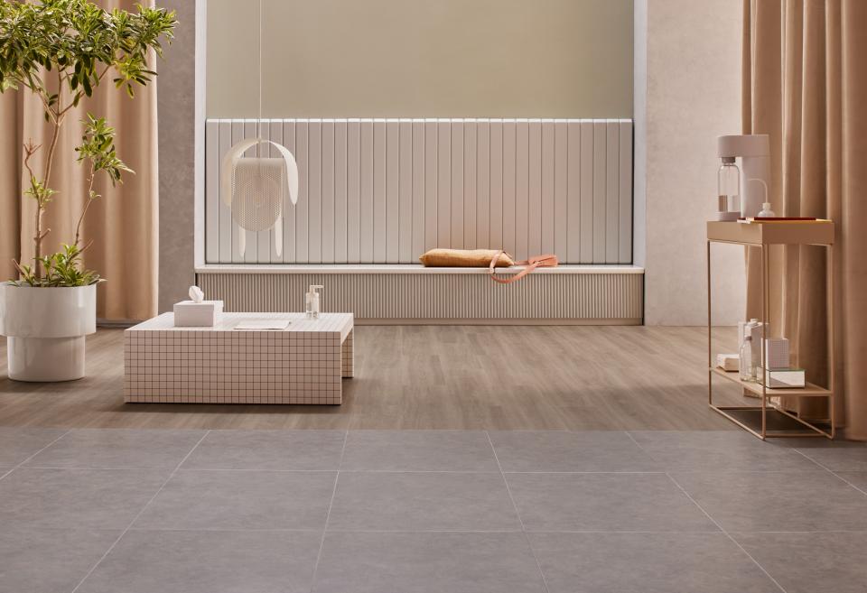 Serene interior featuring Forbo’s Allura Decibel LVT collection, showcasing natural materials and modern decor elements.