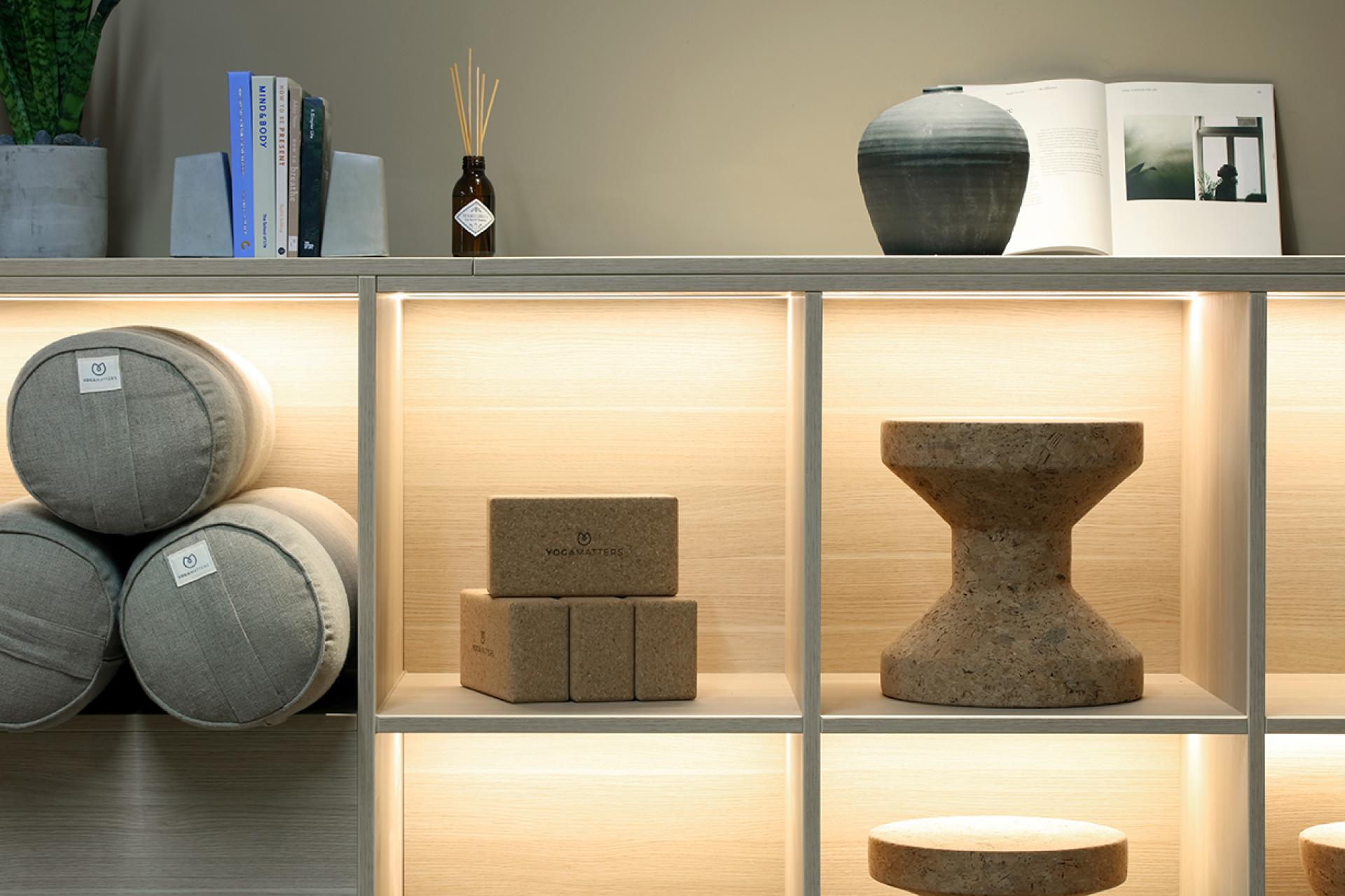 Stylish interior display featuring sustainable design elements, yoga props, and decor in the Eden, New Bailey social hub.