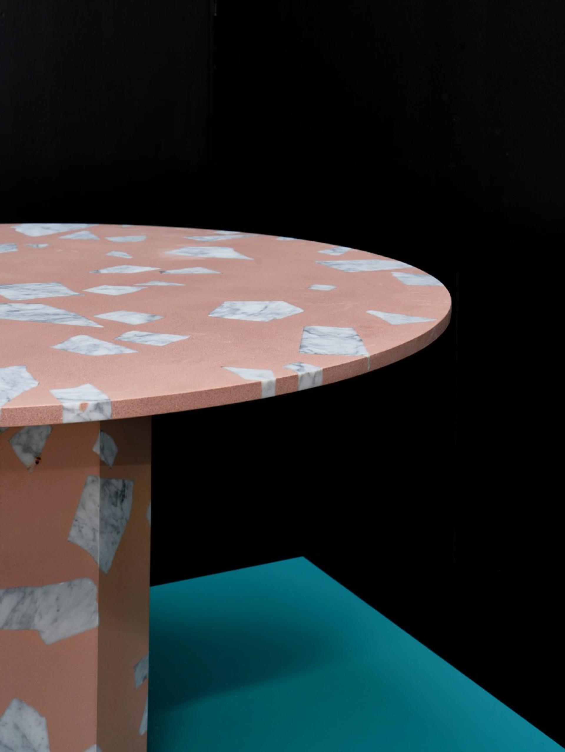 Terrazzo table featuring a pink surface with white marble shards, designed by Robin Grasby of Altrock.