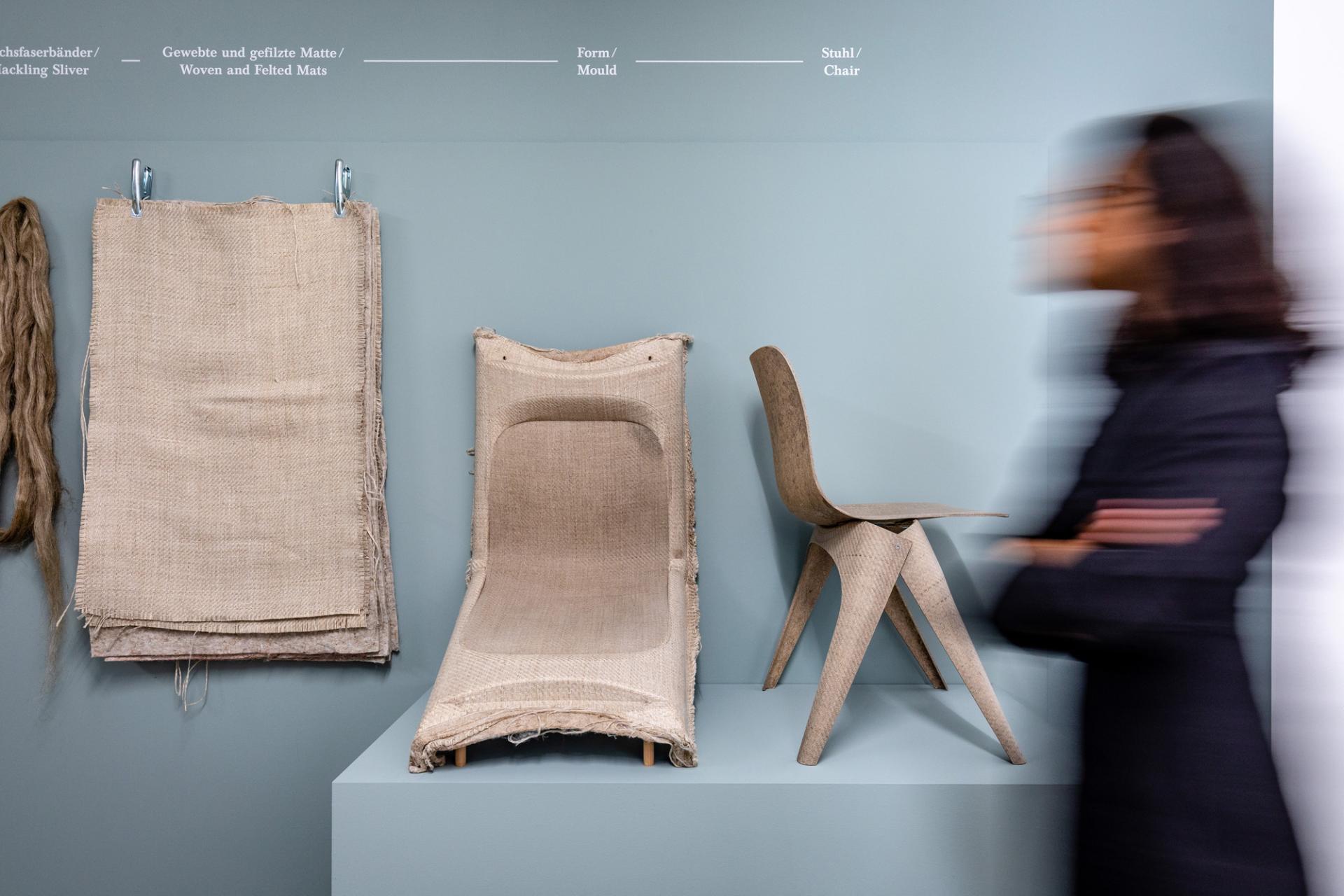 Christien Meindertsma's innovative materials displayed at Vitra Design Museum, featuring a unique chair and textured mats.