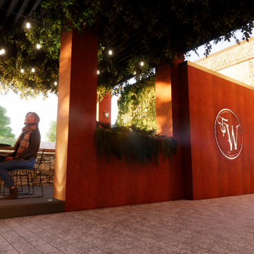 Cozy outdoor seating area with people, surrounded by greenery and decorative lighting, ideal for hospitality experiences.