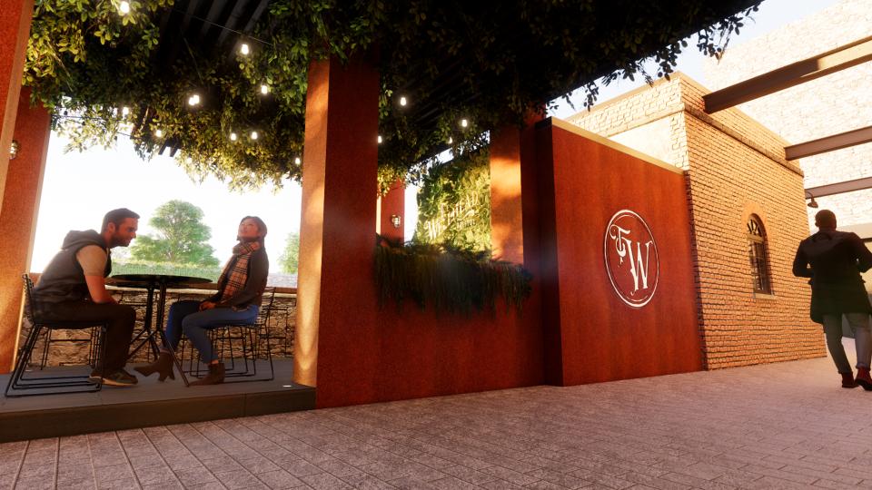 Cozy outdoor seating area with people, surrounded by greenery and decorative lighting, ideal for hospitality experiences.