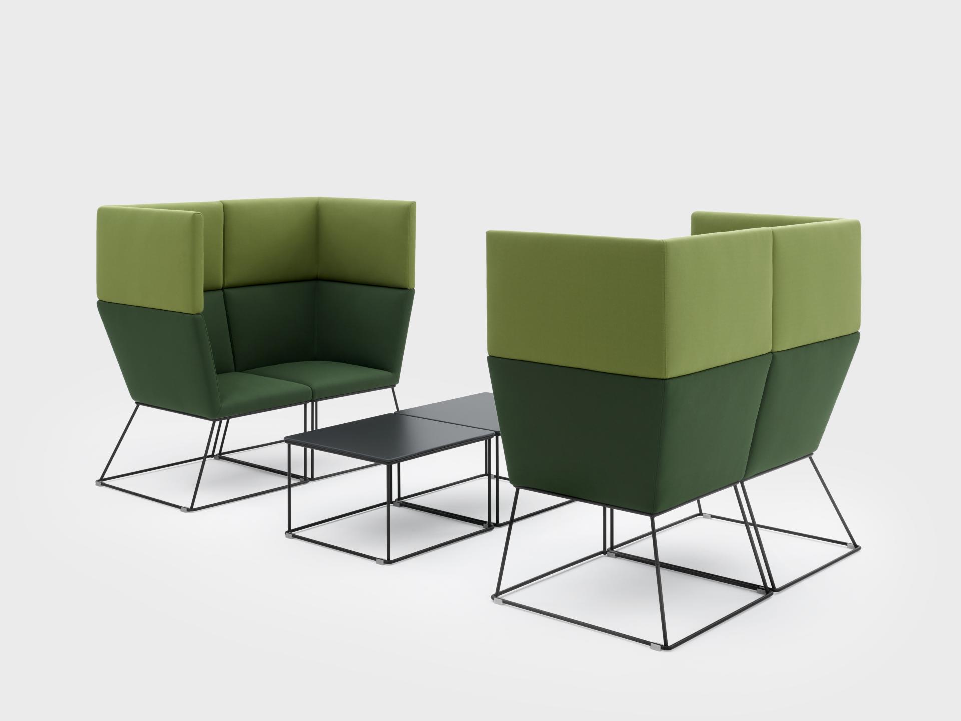 Stylish green seating with high backrests and a modern table, showcasing VIGANÒ & C.'s innovative furniture design.