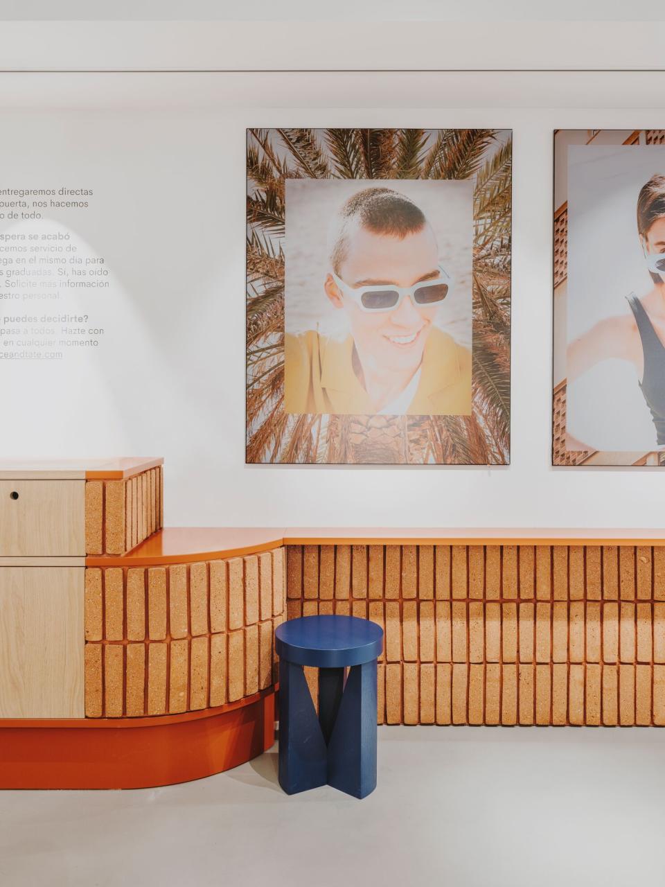 Sustainable interior design featuring cork elements and vibrant colors at ACE & TATE store in Barcelona.
