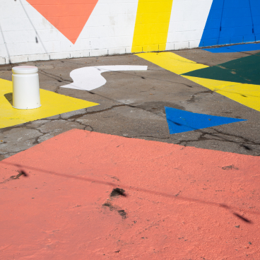 Colorful geometric patterns on the pavement of Hem's first US showroom in downtown Los Angeles.