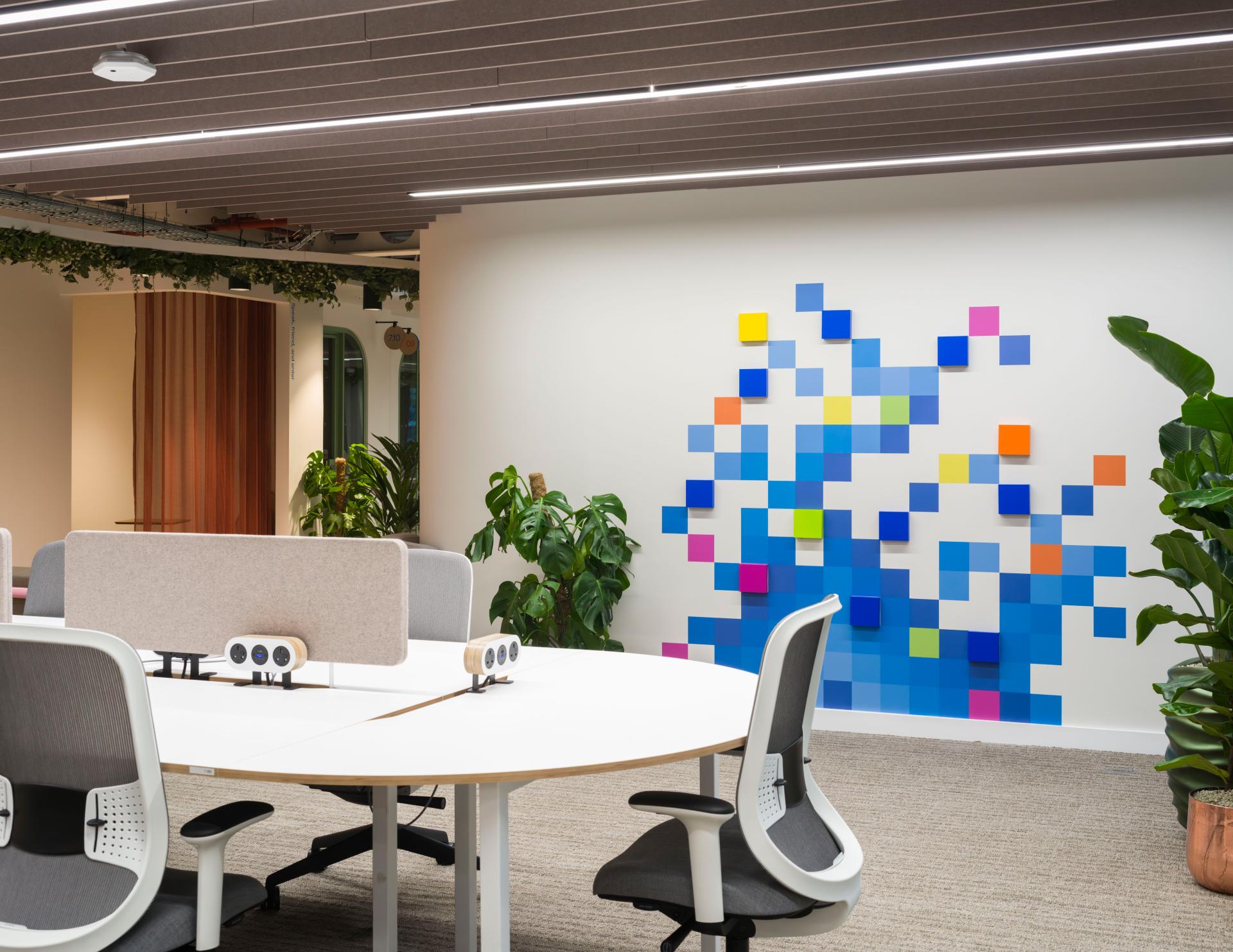 SpaceInvader's workplace scheme for Virgin Media O2 balances vibrancy with variety to support congregation and calm.