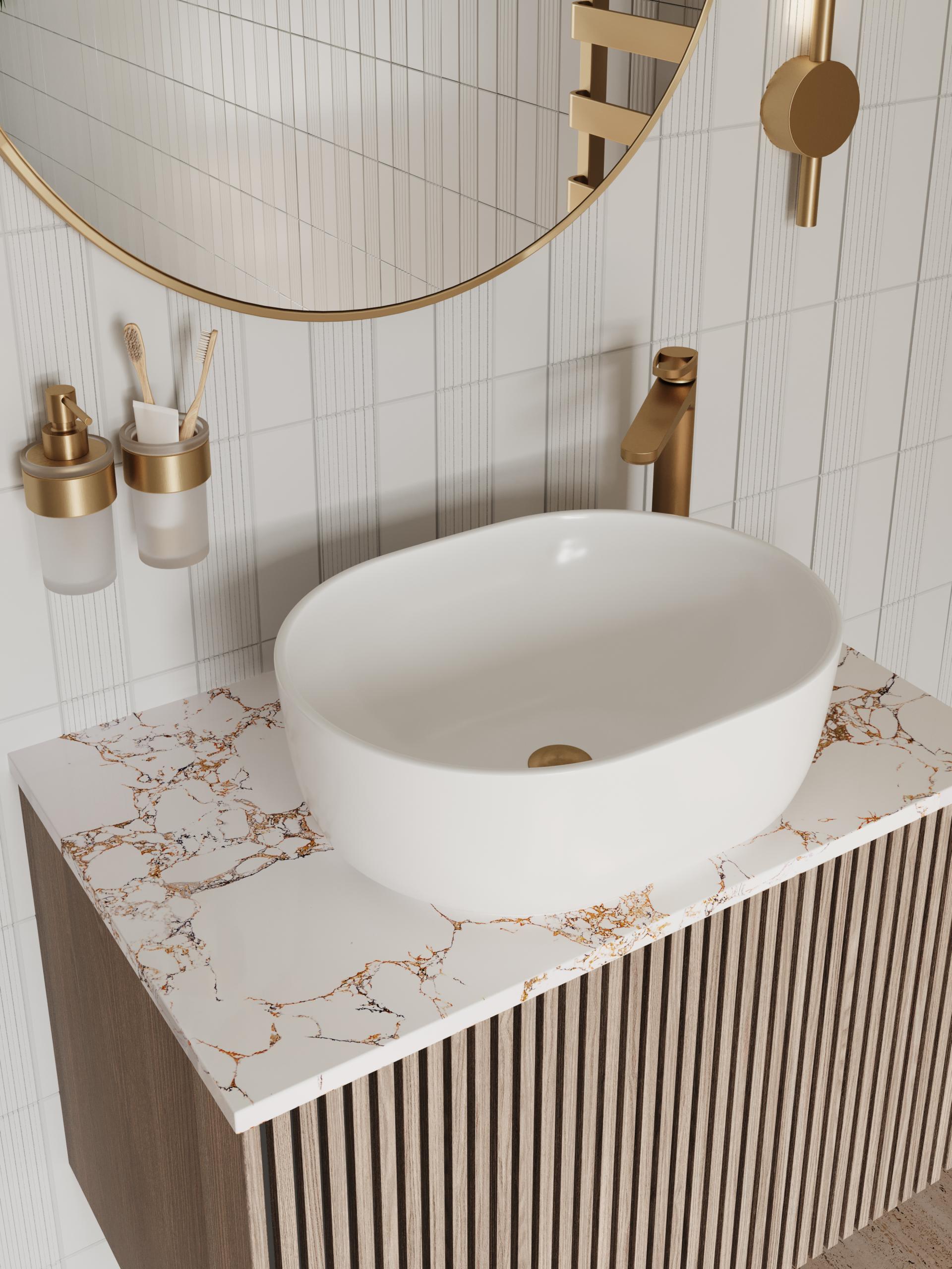 Modern bathroom design featuring a white basin and marble countertop with gold accents, highlighting Japanese Nouveau aesthetics.