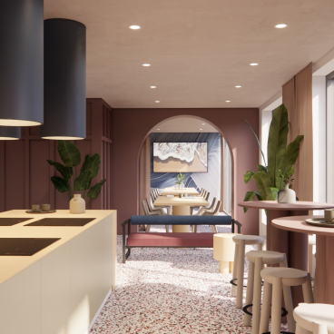 Modern co-living space designed by MONIKA Studio featuring a stylish kitchen and communal dining area with vibrant decor.