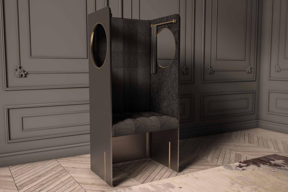 Minimalist chair design by Nabil Issa featuring elegant upholstery and unique circular cutouts in a sophisticated interior setting.