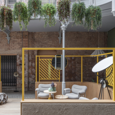 Stylish seating area in Whitworth Locke, a modern aparthotel featuring vibrant design elements in a restored cotton mill.