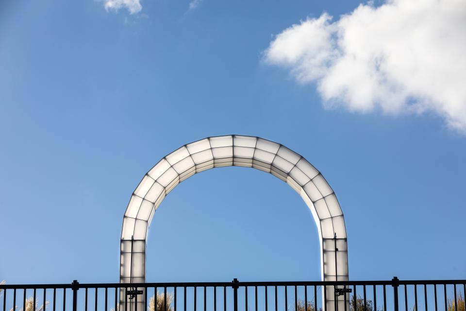 Giant sculptural light installation by Studio Mieke Meijer under a blue sky at Coal Drops Yard.