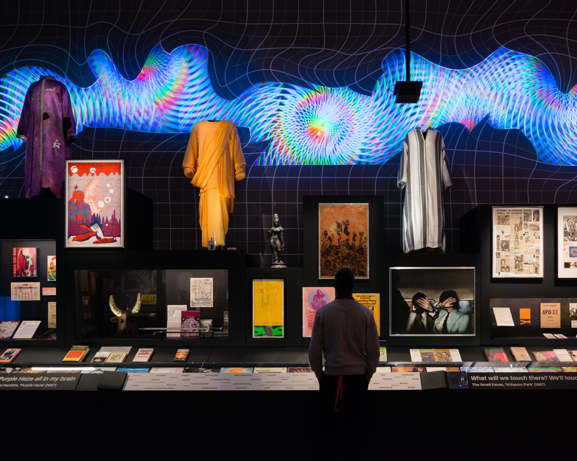 Exhibition showcasing vibrant costumes, artworks, and historical artifacts related to theatre design at Nissen Richards Studio.