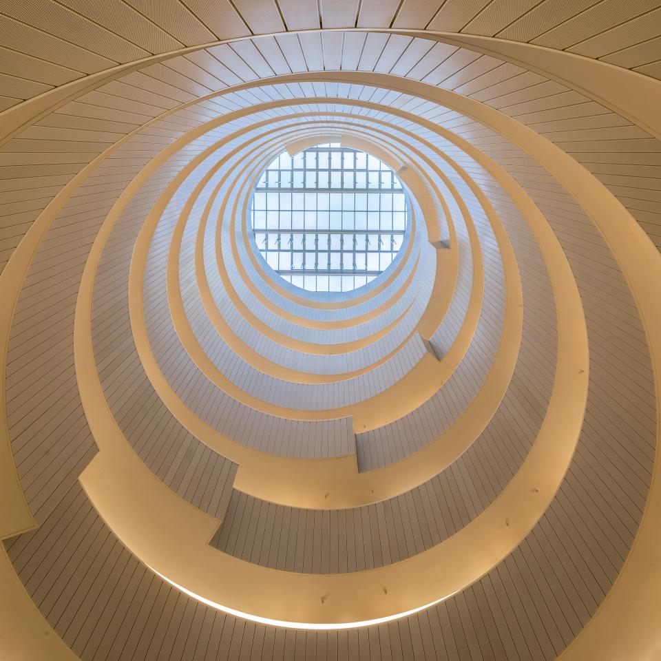 Intricate spiral architecture of Gasholders London, showcasing Roksanda's artistic vision in a luxurious penthouse space.