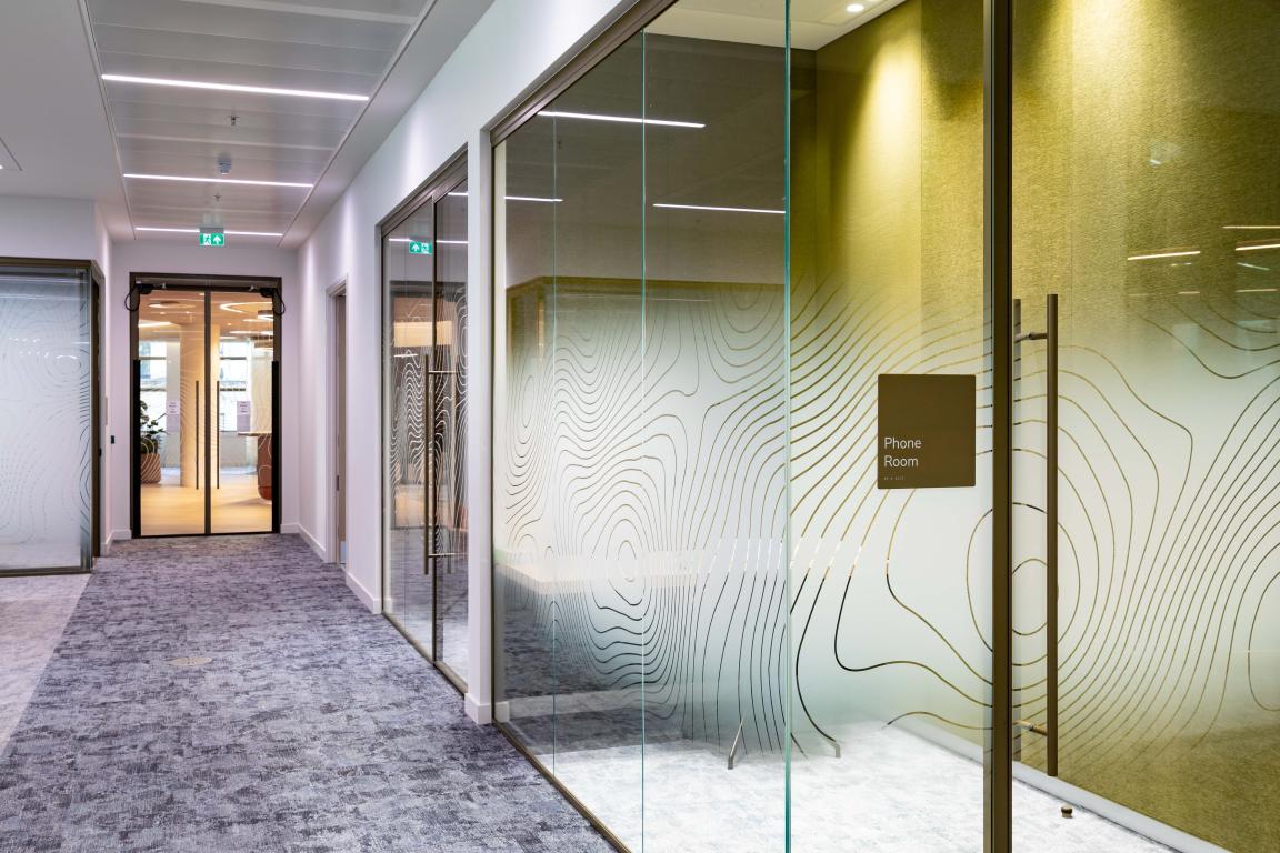 Radii supports tp bennett & Overbury with bespoke bronze framed glazed partitions at banking HQ in London.