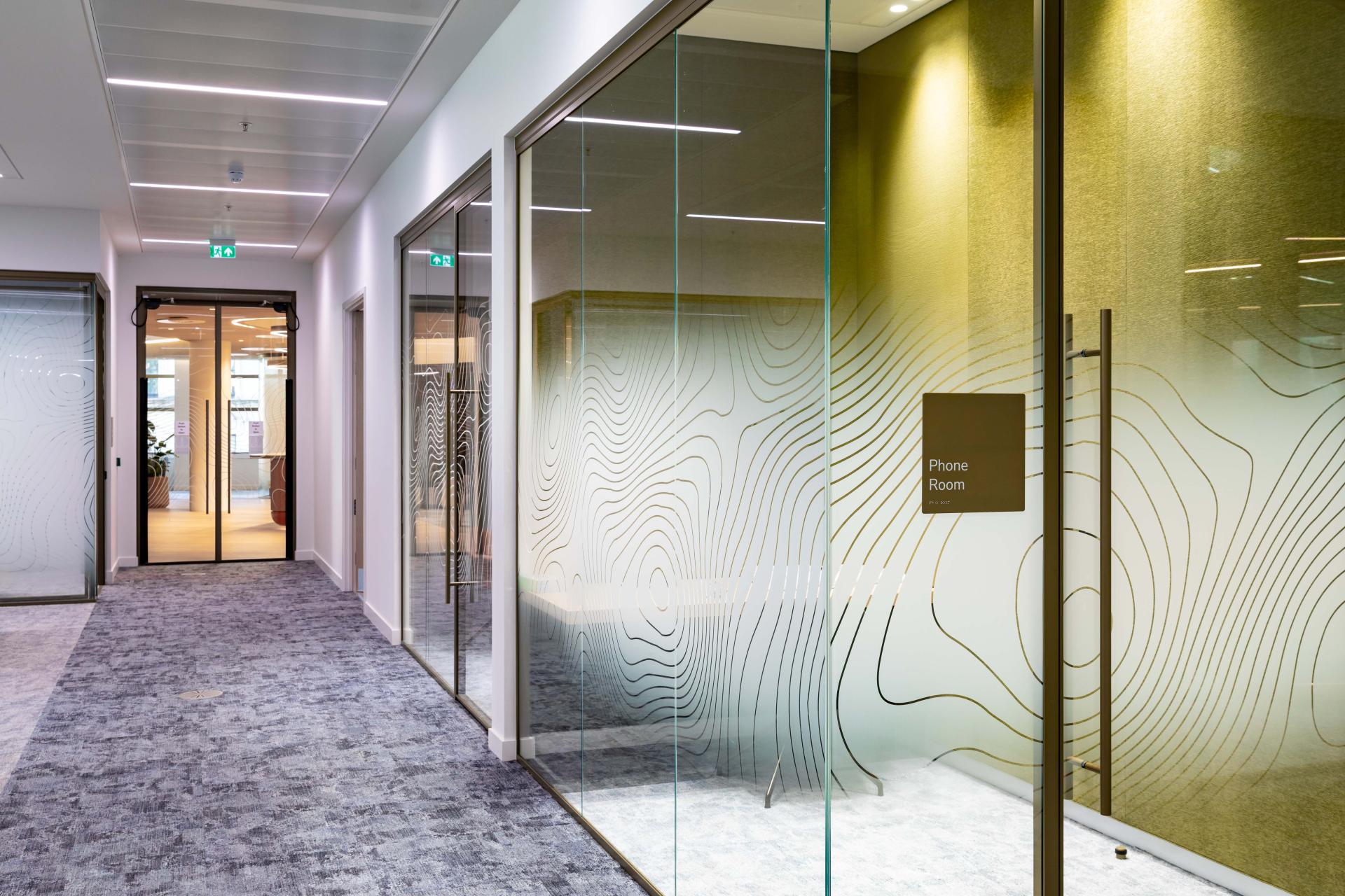 Radii supports tp bennett & Overbury with bespoke bronze framed glazed partitions at banking HQ in London.