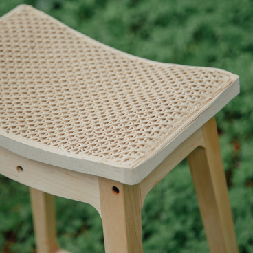 WoodenWood Stool featuring a unique woven surface created from 3D-printed sawdust, designed for sustainability in furniture.