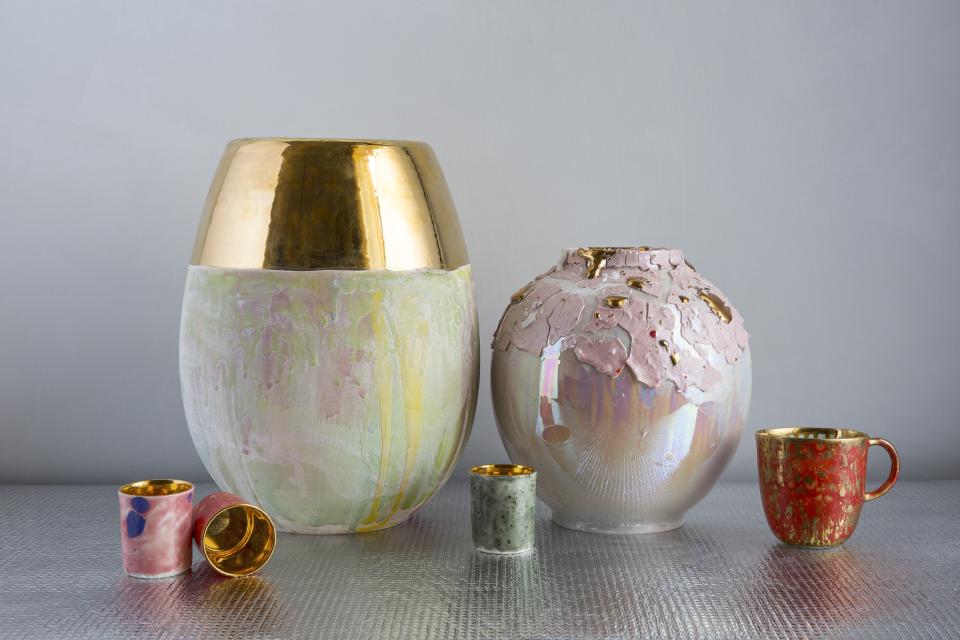 Coralla Maiuri's Bottega d’Arte vases feature iridescent finishes and unique shapes, showcasing artistic elegance and volcanic inspiration.
