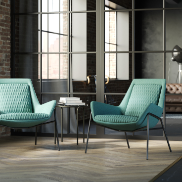 Stylish Klyro collection chairs in a modern workspace, showcasing elegant design and functional commercial furniture.