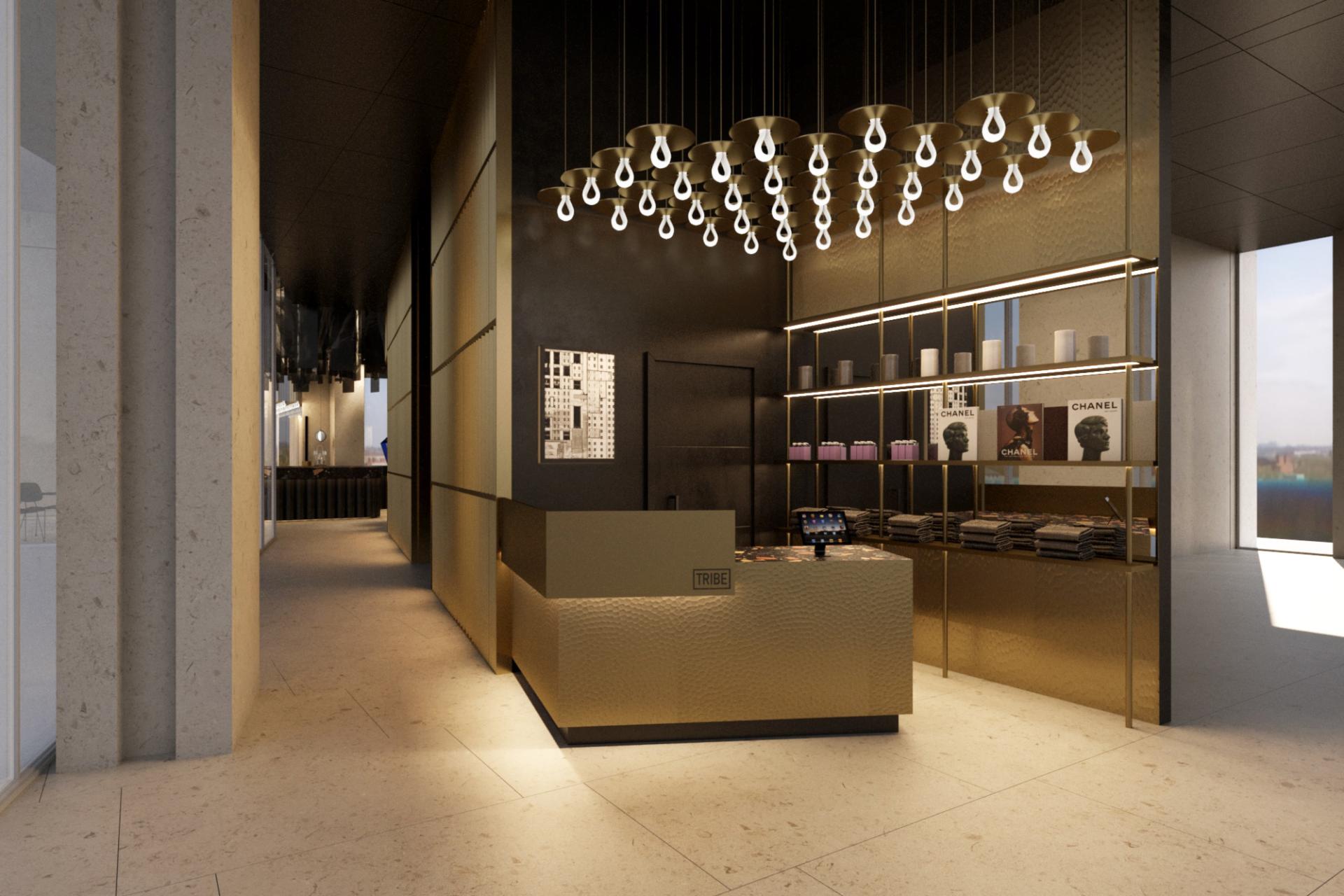 Tribe hotel's stylish reception area featuring modern design, elegant lighting, and artistic decor elements in Malta.