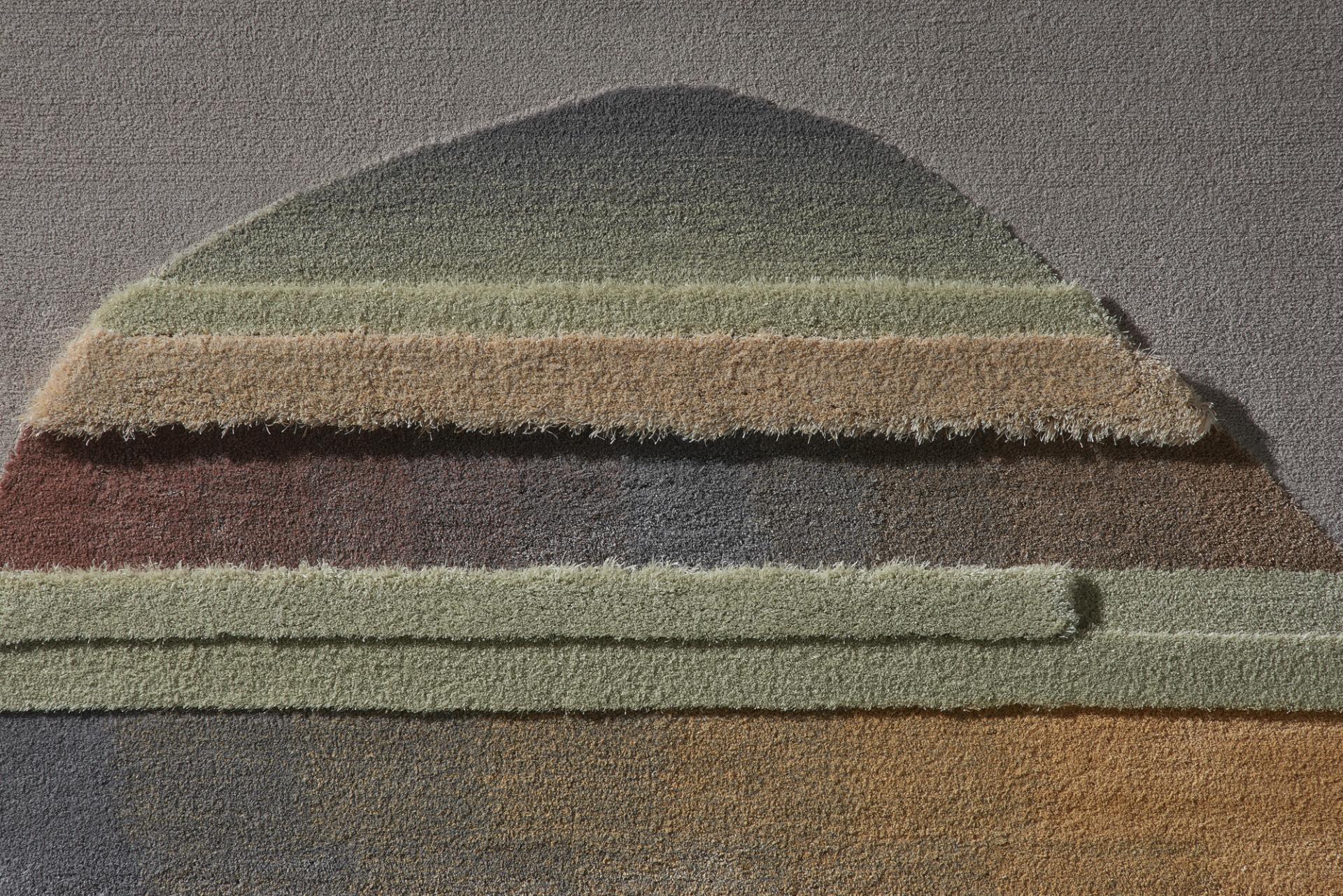 Textured abstract rug design by Agnė Kučerenkaitė, showcasing innovative color and material use in sustainable design.