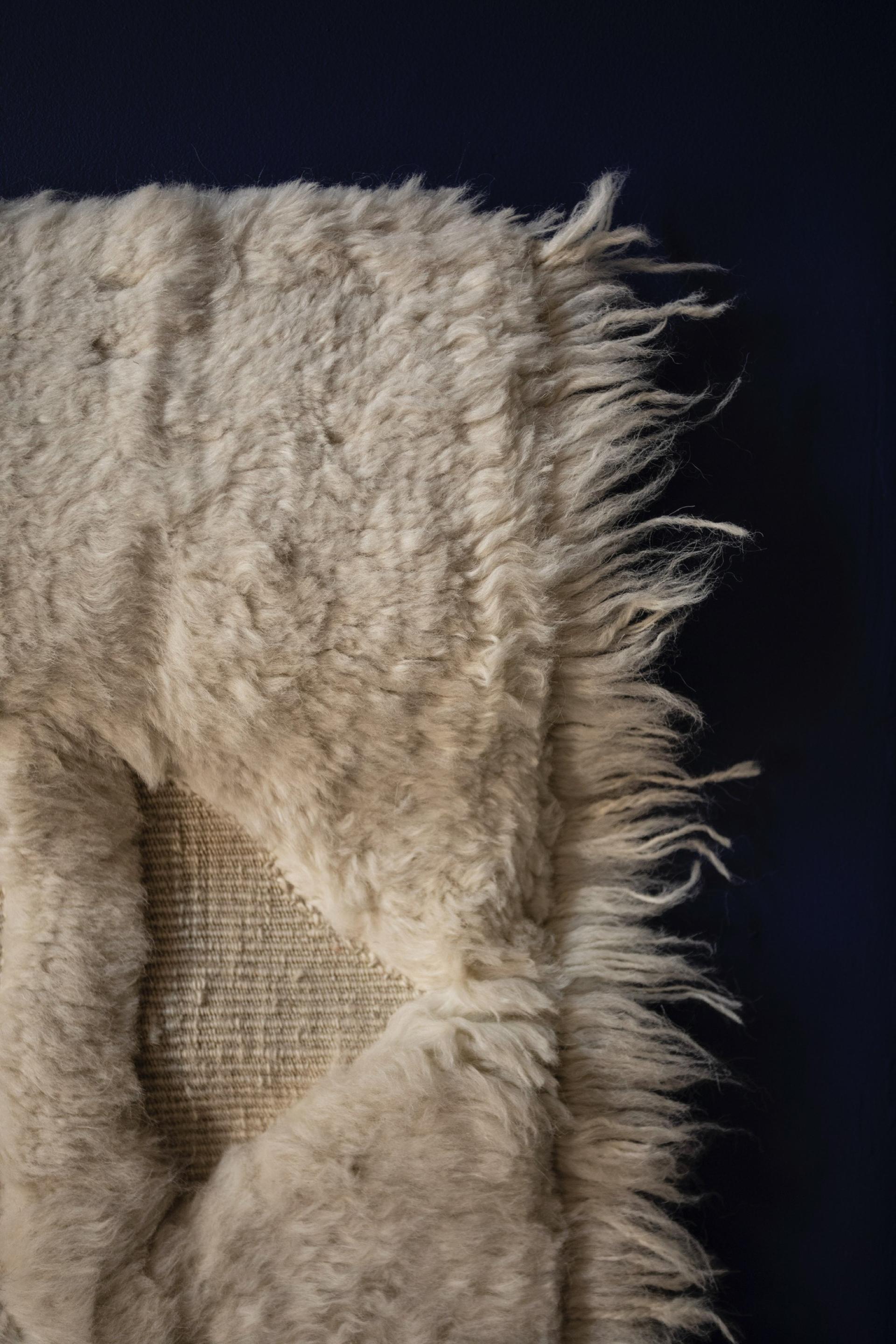 Textured textile artwork by Dharma Taylor, showcasing memory through materials and exploring narratives in fabric and fiber.