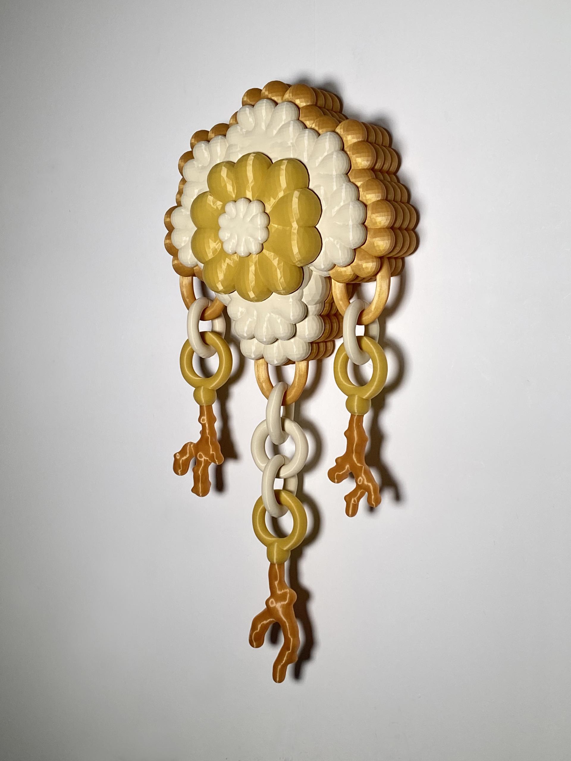 Textured abstract wall sculpture by Soorin Shin, featuring floral designs in yellow and cream colors, showcasing 3D printing artistry.