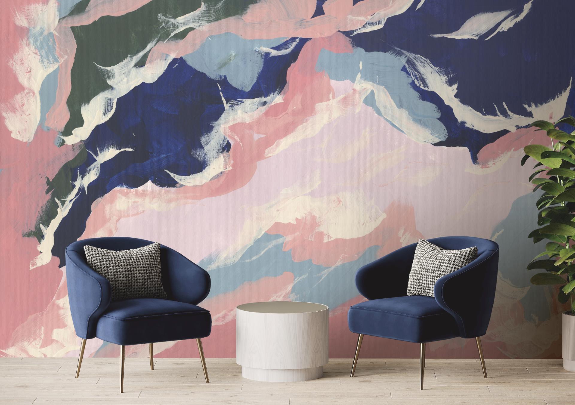 Vibrant mural featuring organic shapes and colors, complementing stylish navy chairs and a modern coffee table in a serene interior.
