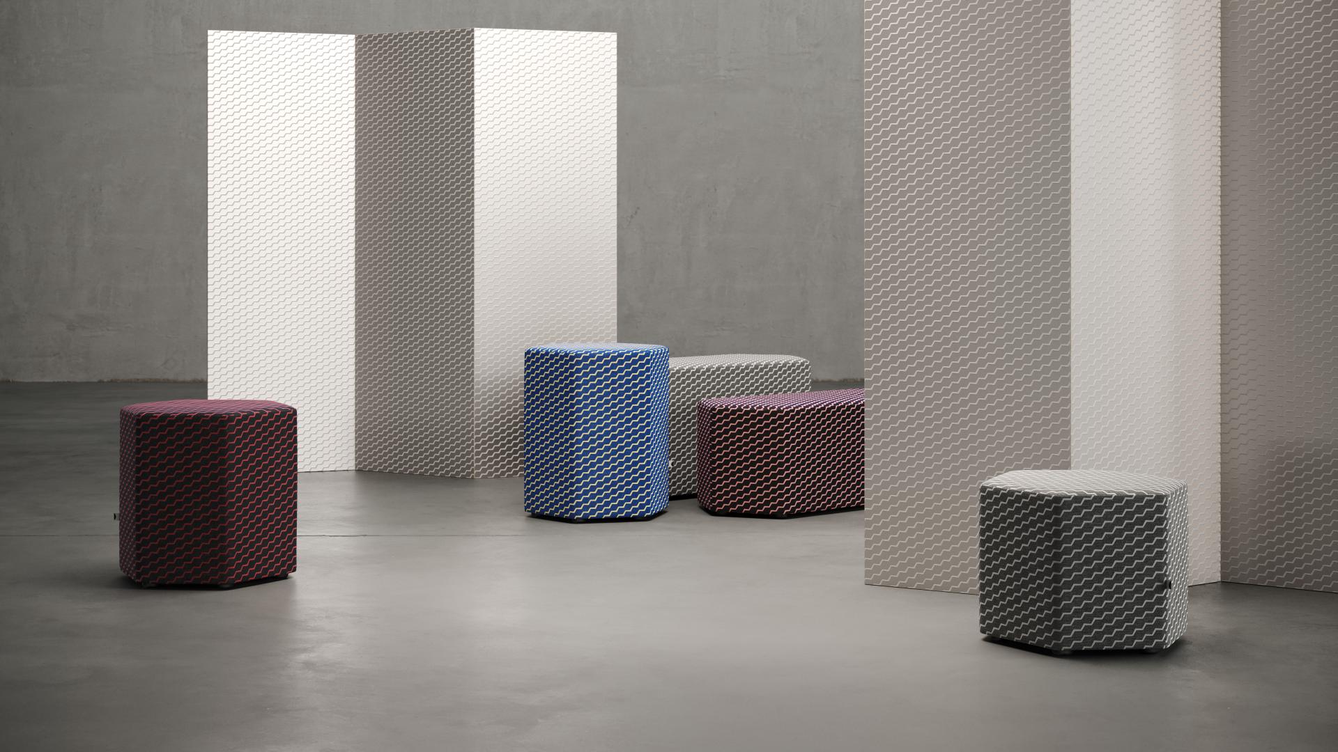 Modern Flock collaboration features vibrant, patterned stools and textured partitions designed by Erica Wakerly for contemporary interiors.