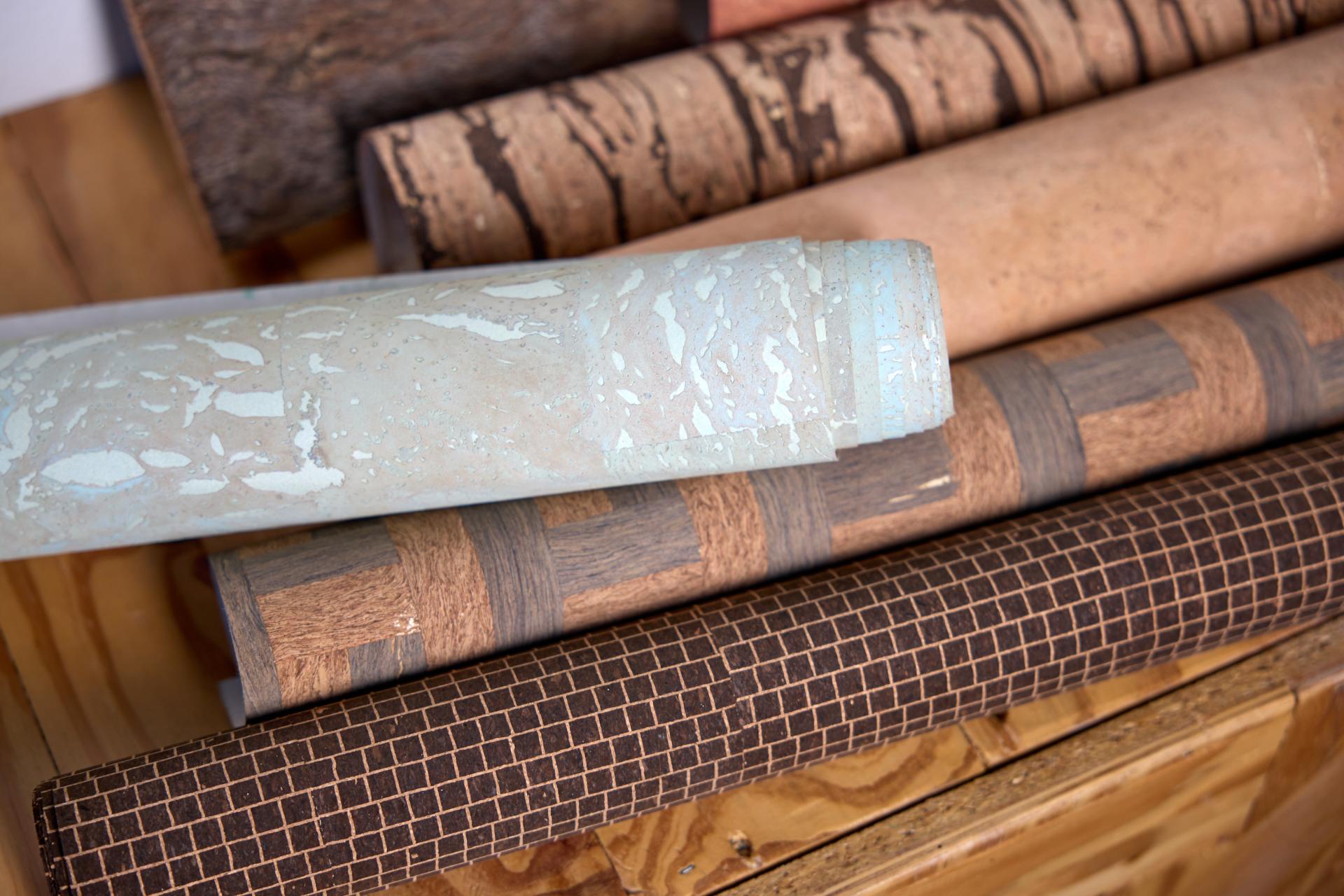 Variety of textured and patterned biomaterial rolls, showcasing sustainable options for low carbon construction and design in 2025.