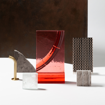 Colorful decorative objects displayed in a contemporary design showroom, showcasing an innovative co-working space concept by Holloway Li.