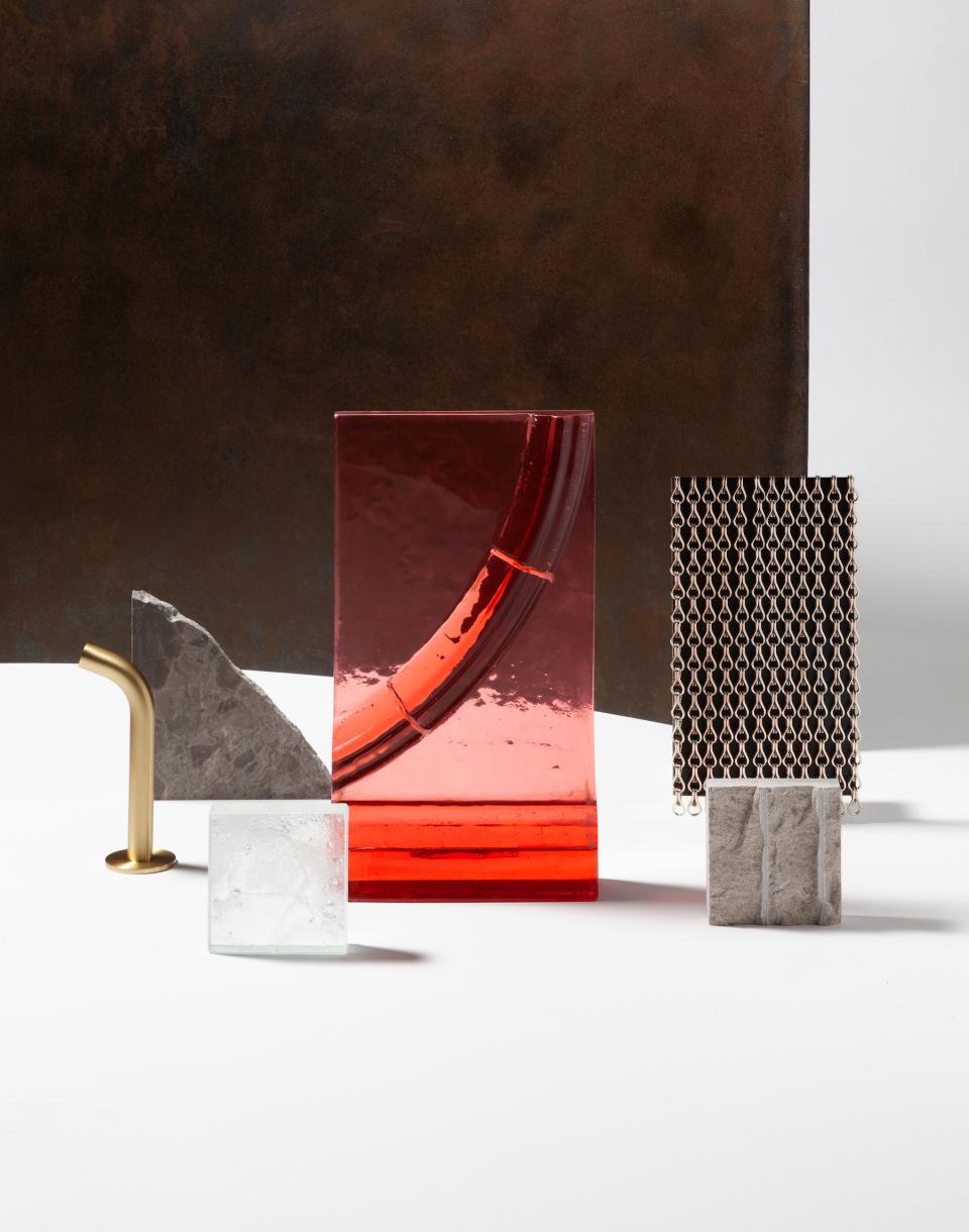 Colorful decorative objects displayed in a contemporary design showroom, showcasing an innovative co-working space concept by Holloway Li.