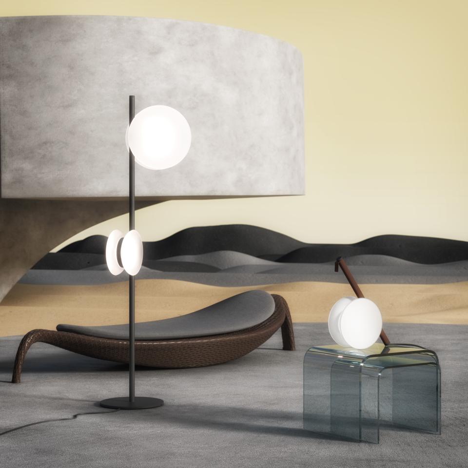 Contemporary lighting designs by Fabbian showcased in a minimalist, artistic environment highlighting beauty and innovation.