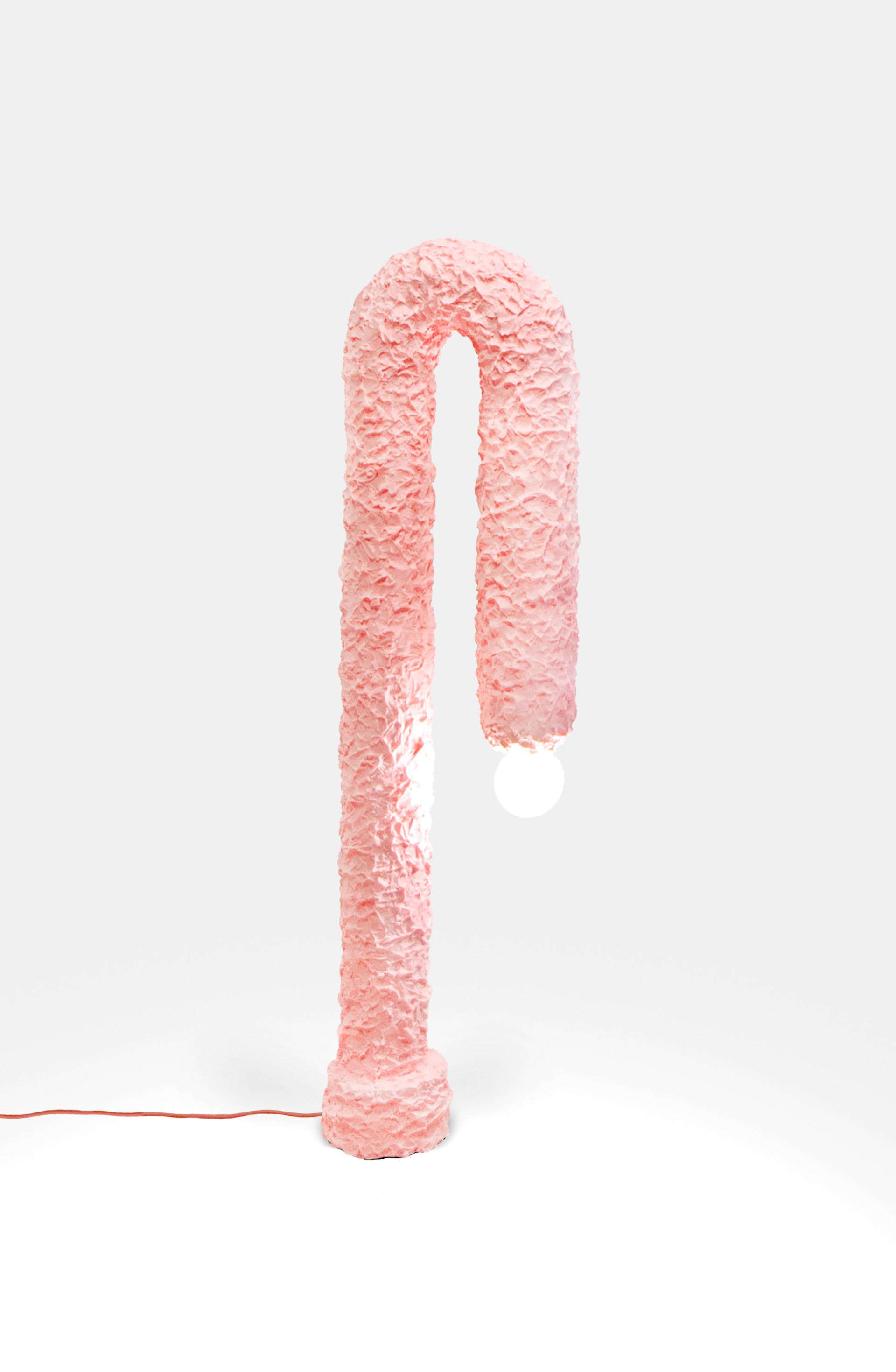 Unique pink textured lamp with a bold design featured in Adorno's Matérialité collection for Paris Design Week.