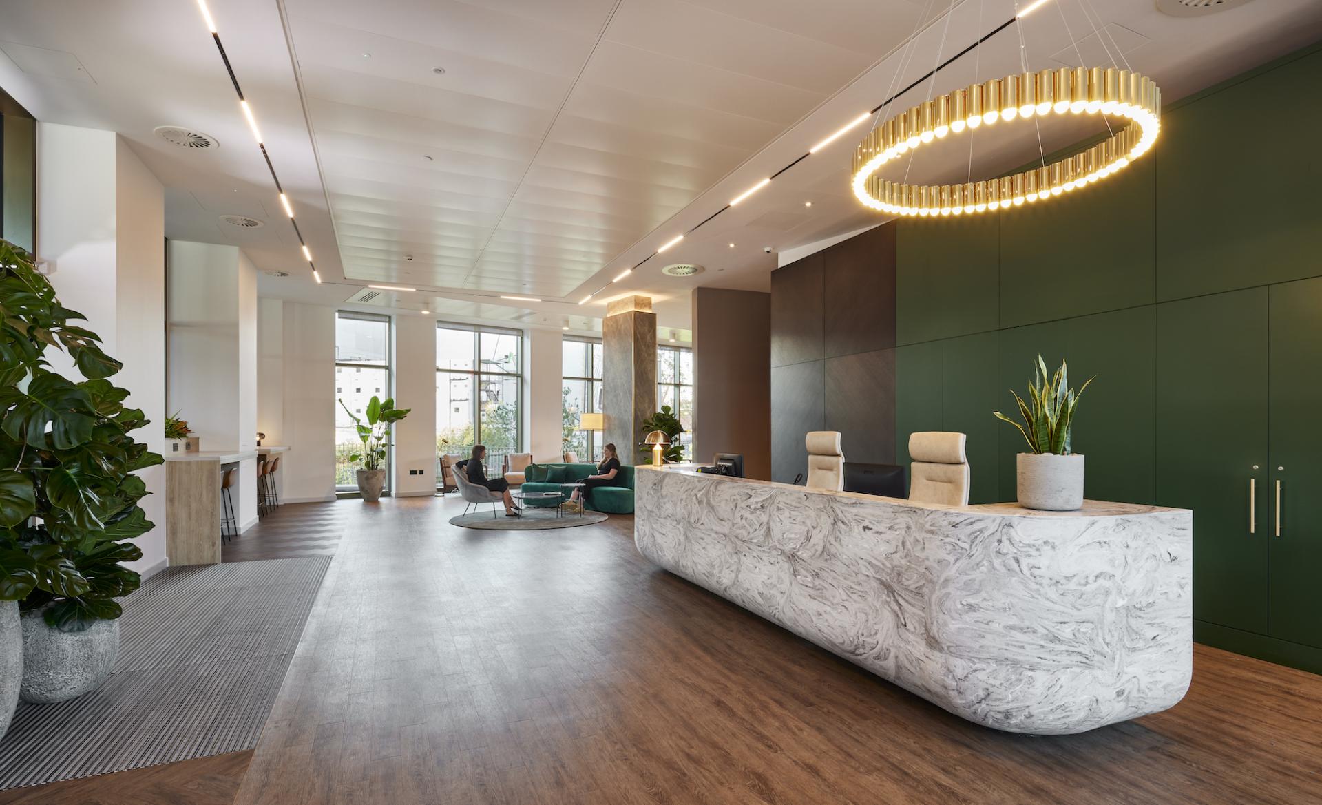 Elegant residential amenity space designed by SpaceInvader at Novella, featuring modern decor and natural lighting.