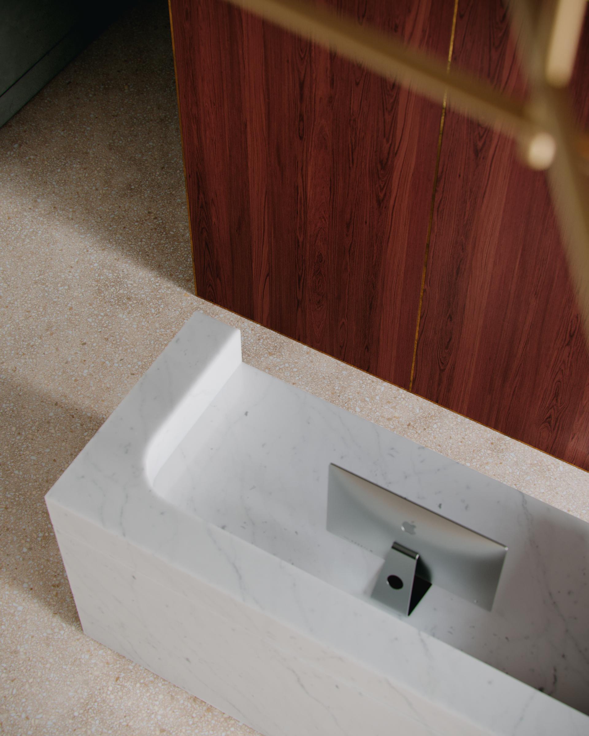 Modern workspace featuring a sleek marble desk with a computer, complemented by elegant timber wall panels for acoustic design.