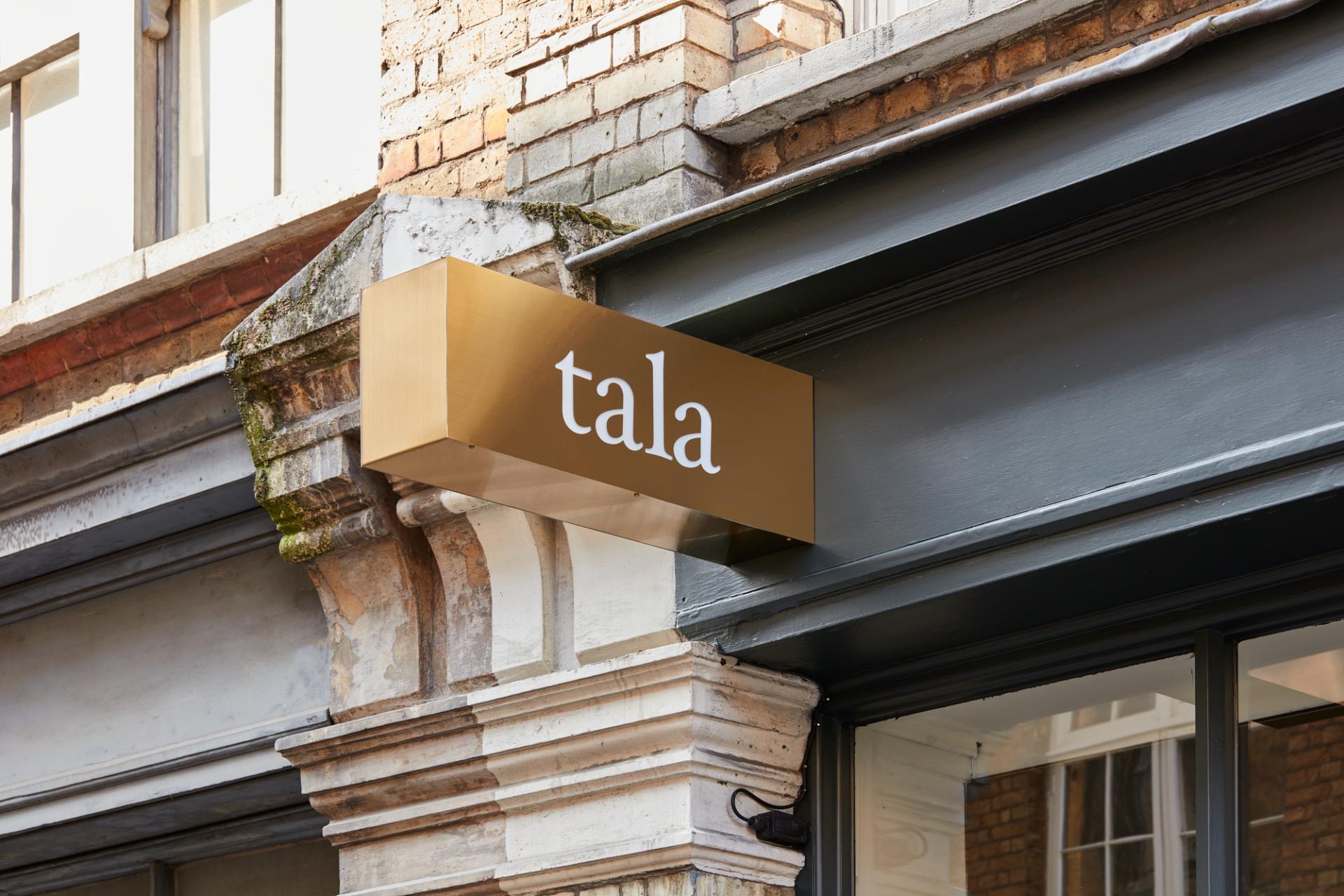 Tala's sleek exterior signage on a Shoreditch showroom highlights its commitment to sustainable luxury lighting design.