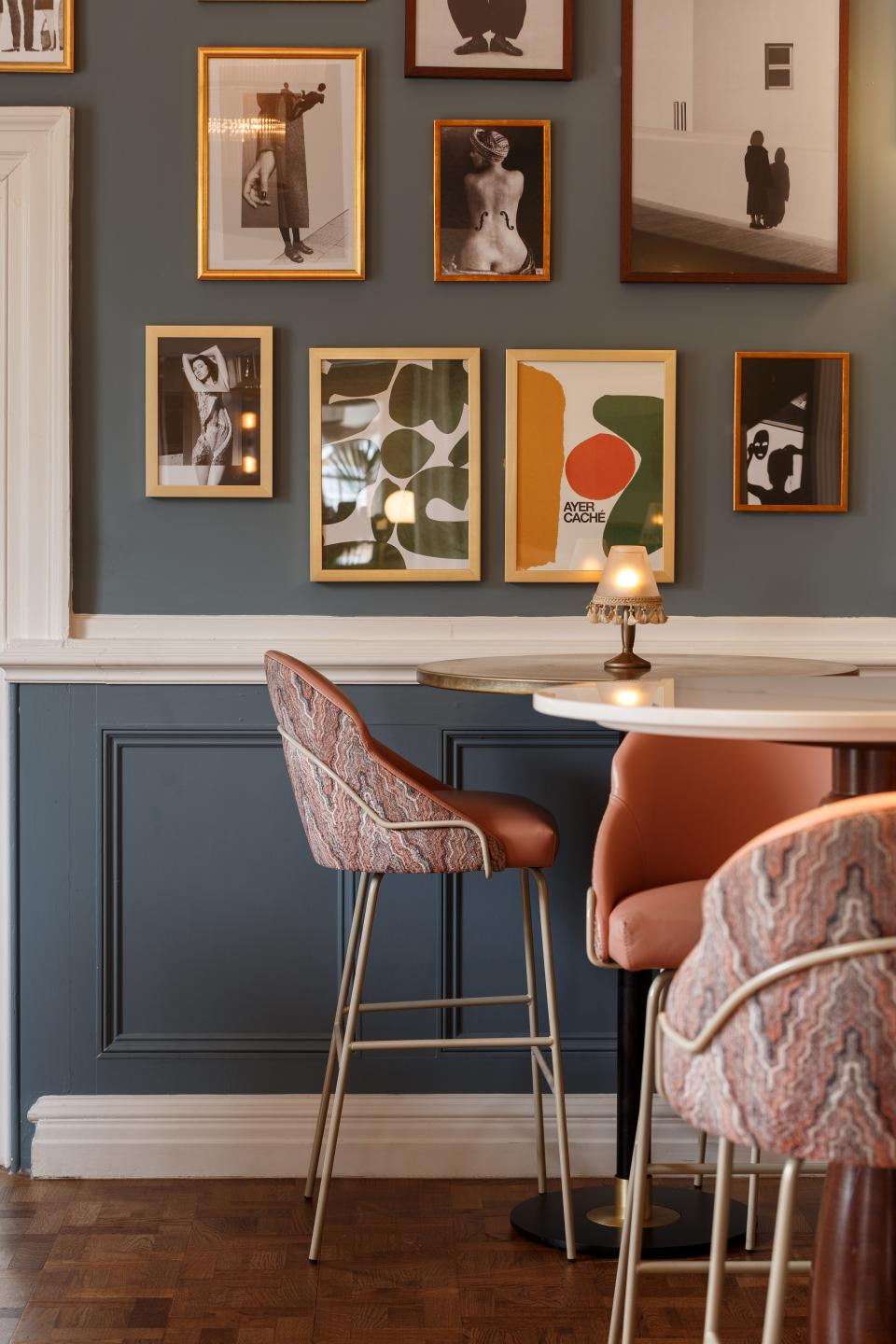 Heritage-inspired interior featuring framed art and stylish seating at The Orange Tree in Congleton.