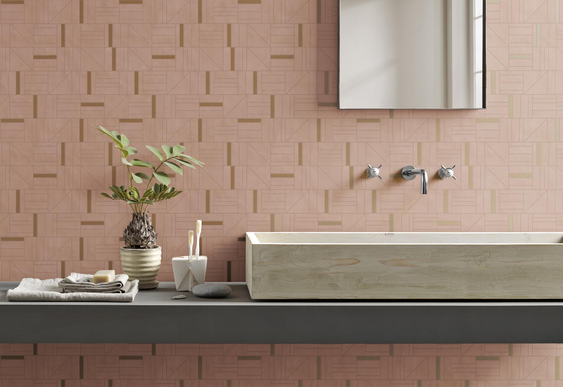 Modern bathroom design featuring geometric tile patterns, natural accents, and a wooden sink, showcasing CERSAIE 2019 trends.