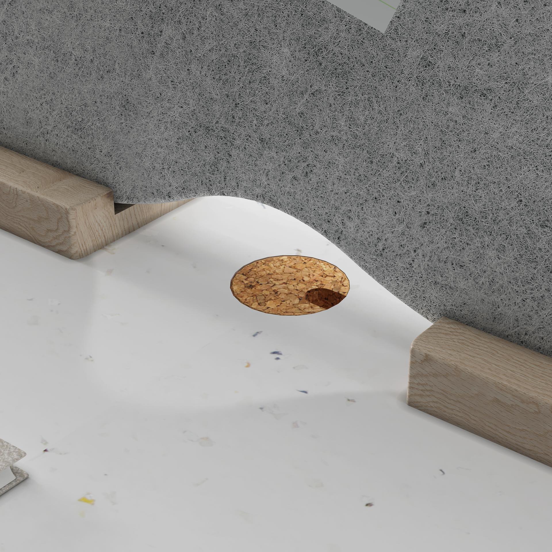Curved desk surface with a natural cork hole, showcasing sustainable materials for future workplace furniture designs.