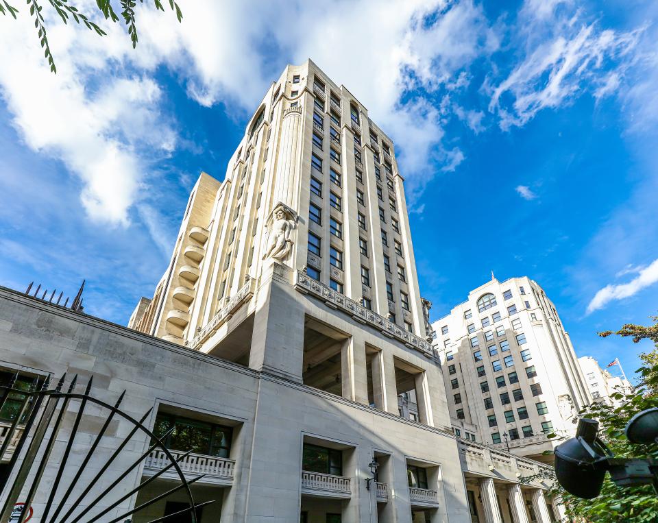Architectural view of the Adelphi Building, highlighting its eco-friendly design elements for The Economist Group's workspace.