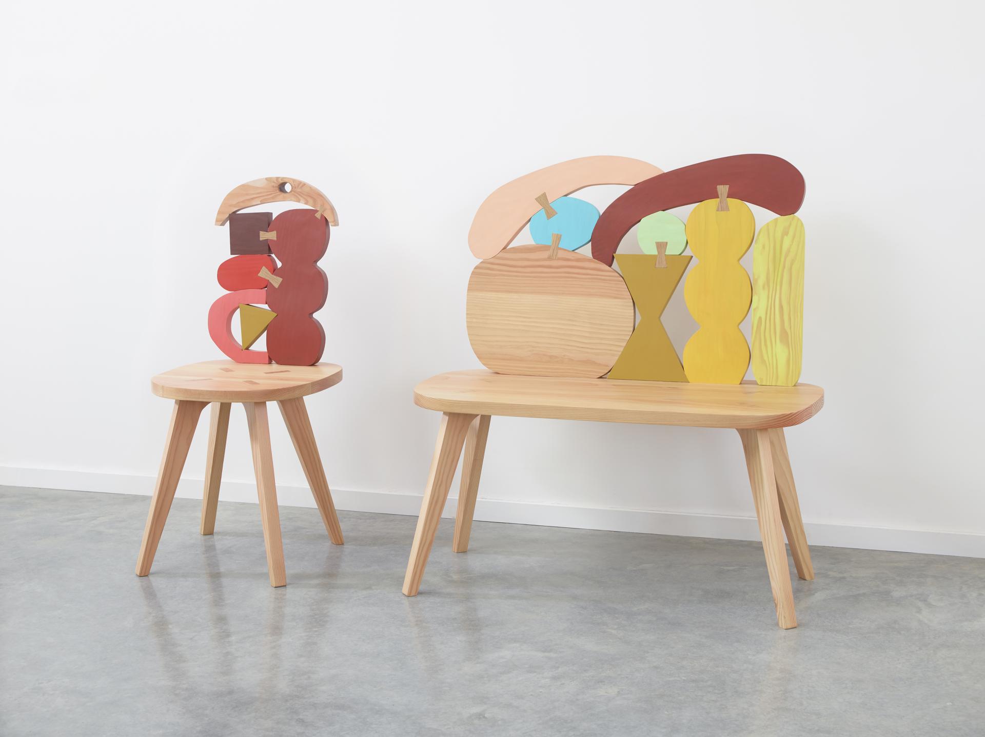 Colorful contemporary chairs designed by Donna Wilson, showcasing unique abstract shapes and high-quality wooden materials.