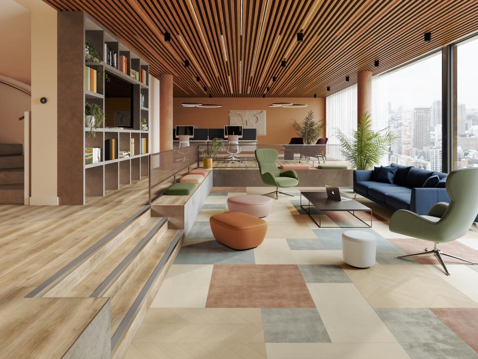 Modern commercial interior showcasing vibrant color and texture elements, promoting wellbeing and creativity in workspace design.