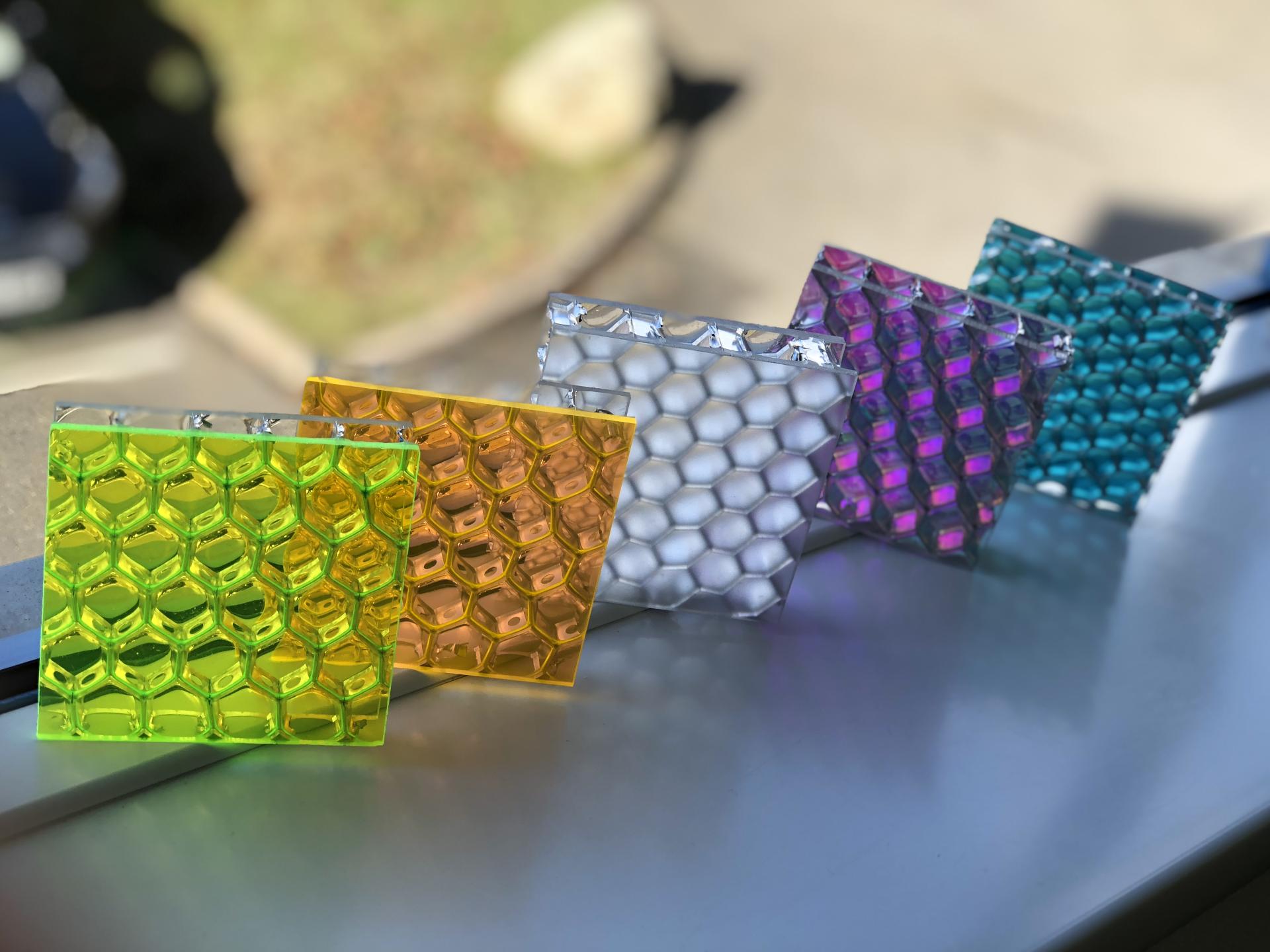 Colorful decorative aluminium composite panels with a honeycomb design, showcasing innovative surface materials by Mykon.