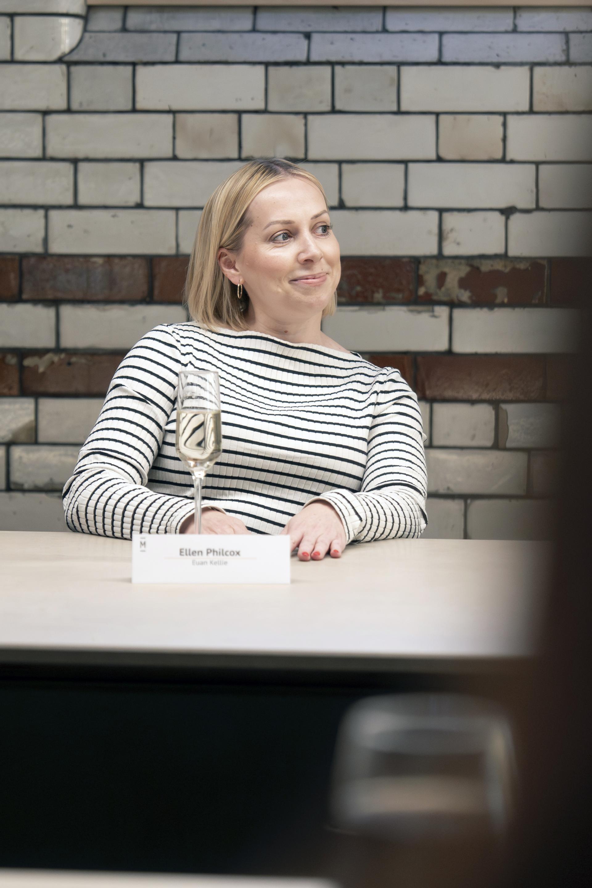 Ellen Philcox engages in discussion at a Manchester property seminar, highlighting residential mix topics in the city.