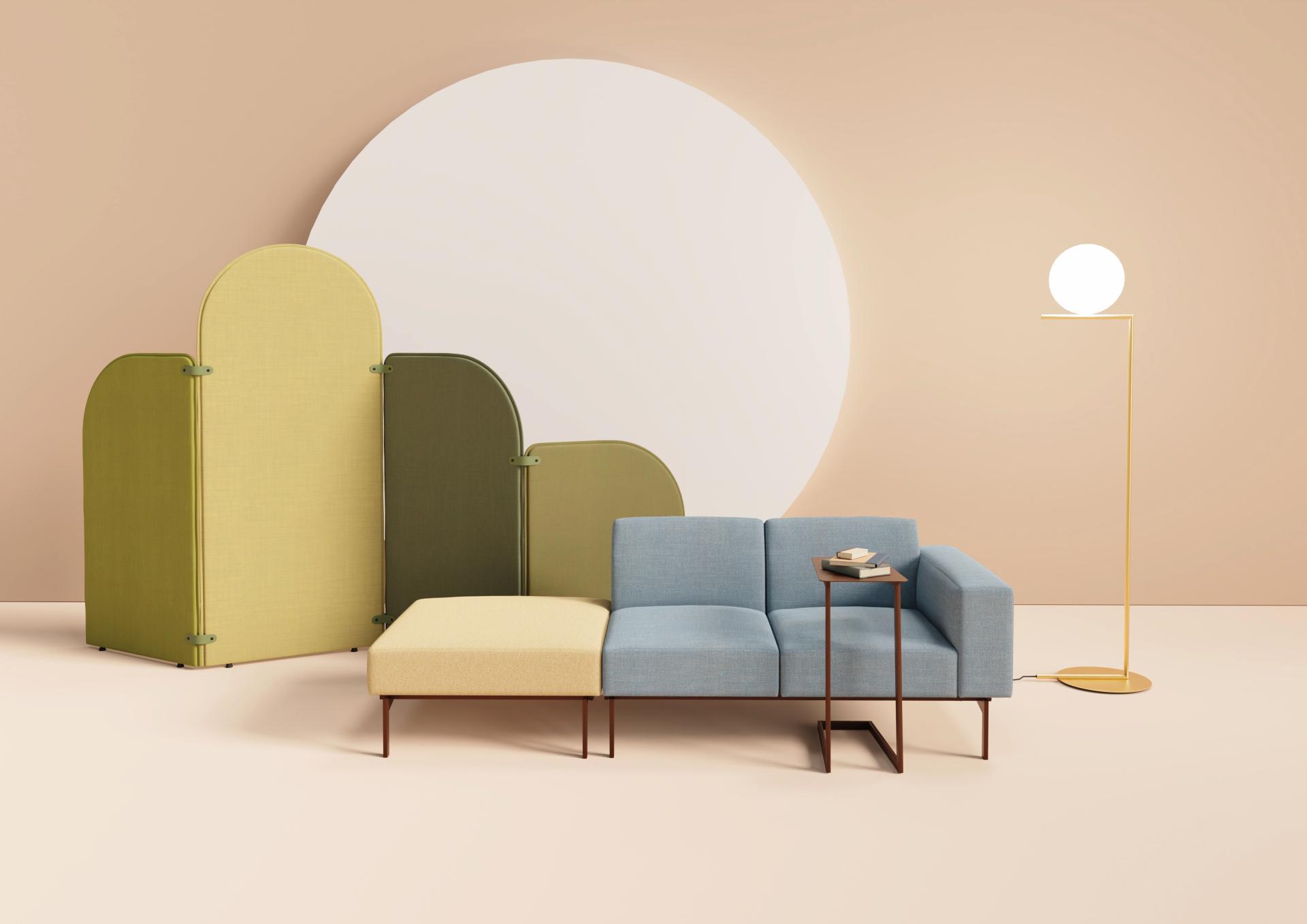 Modular screen system Artus beside a blue sofa and minimalist lamp, showcasing playful postmodernist design in a modern workspace.